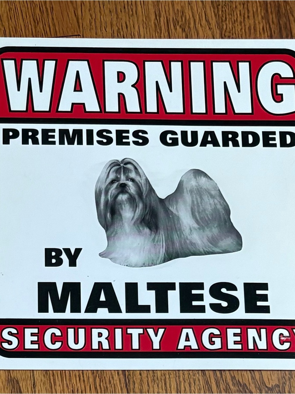 warning premises guarded by maltese security agency sign